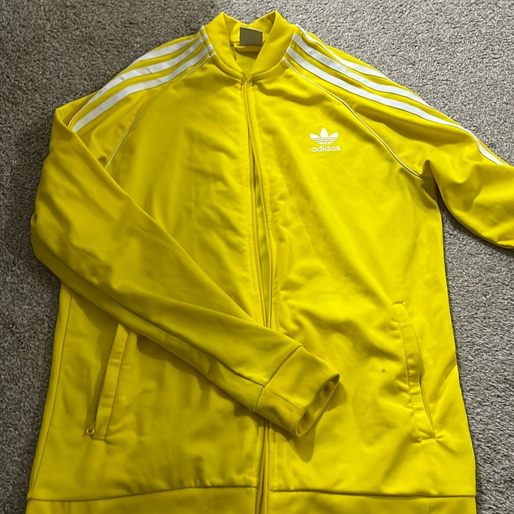 Adidas yellow sweater , with small stain , size XL for women
